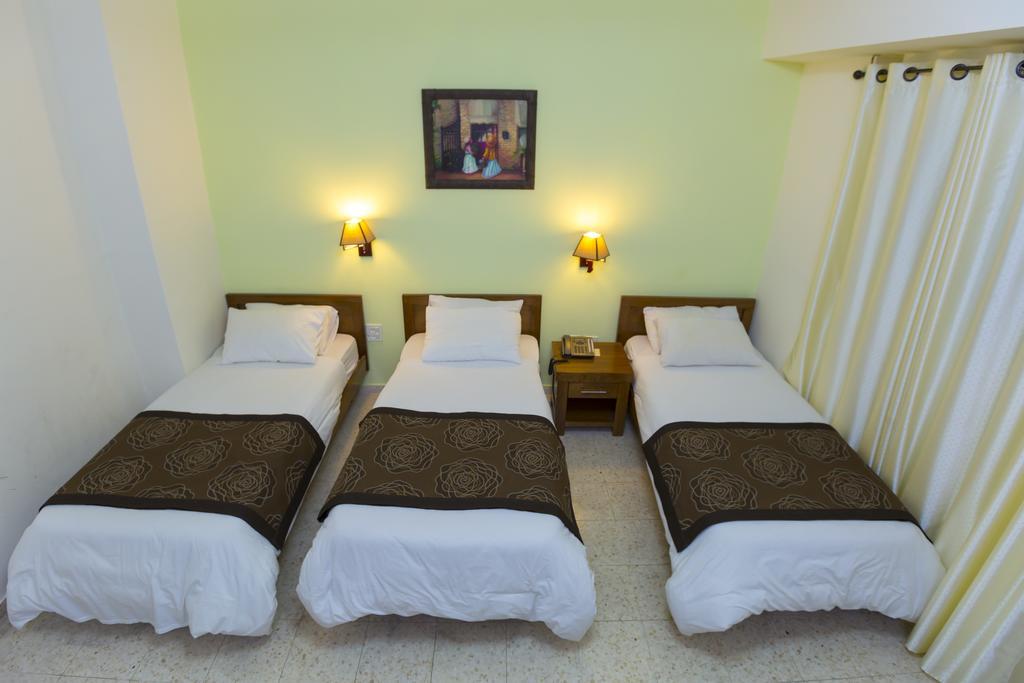Angel Hotel Belén Habitación foto